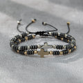 Pulsera apilable de hematita con abalorios y 2 cruces