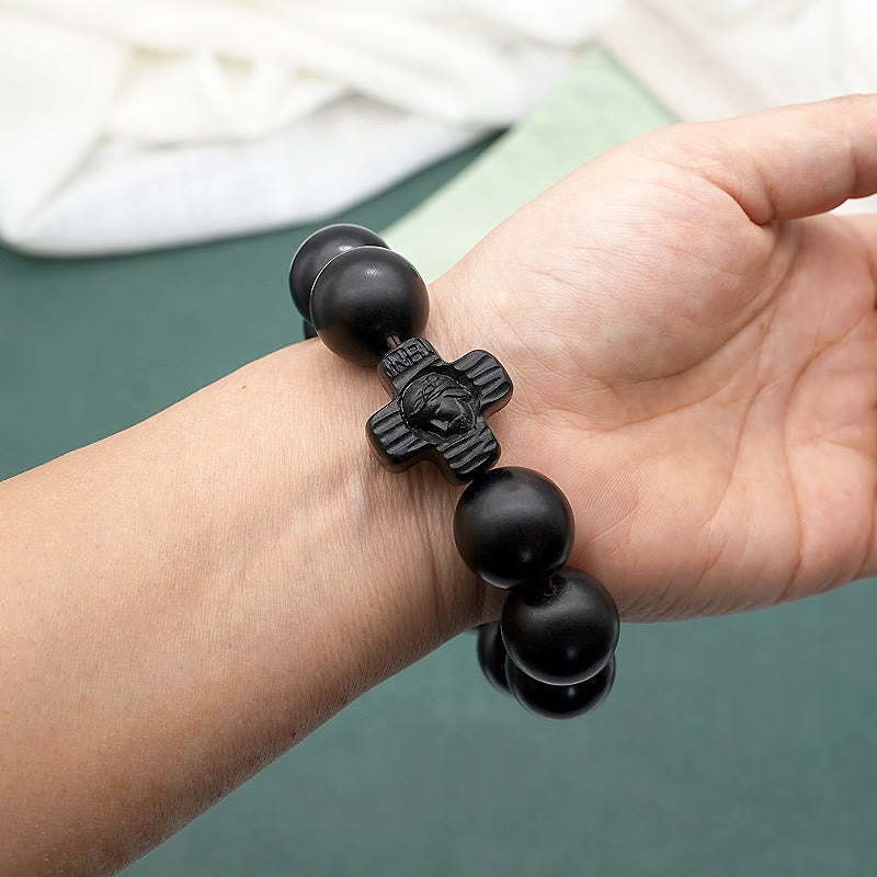 Pulsera de rosario de sándalo negro con cruz clásica de Jesucristo