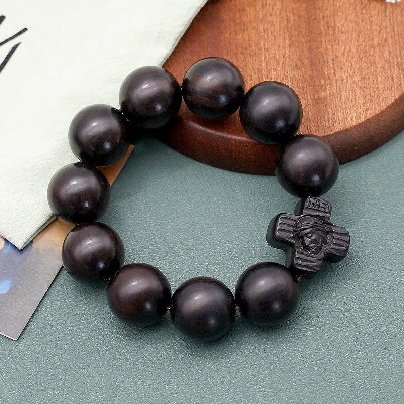 Pulsera de rosario de sándalo negro con cruz clásica de Jesucristo
