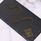 Collar de cruz de bronce con corazón sagrado esculpido de estilo clásico europeo