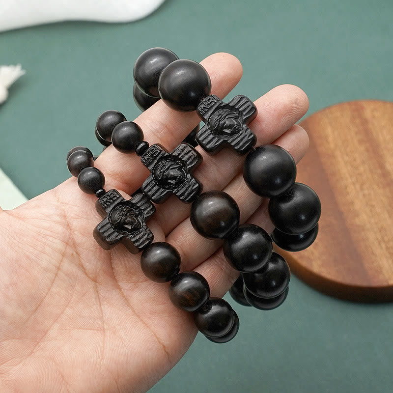 Pulsera de rosario de sándalo negro con cruz clásica de Jesucristo