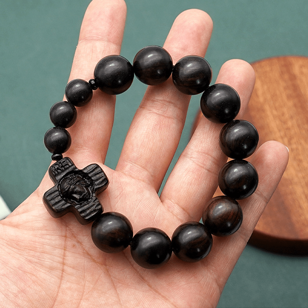 Pulsera de rosario de sándalo negro con cruz clásica de Jesucristo