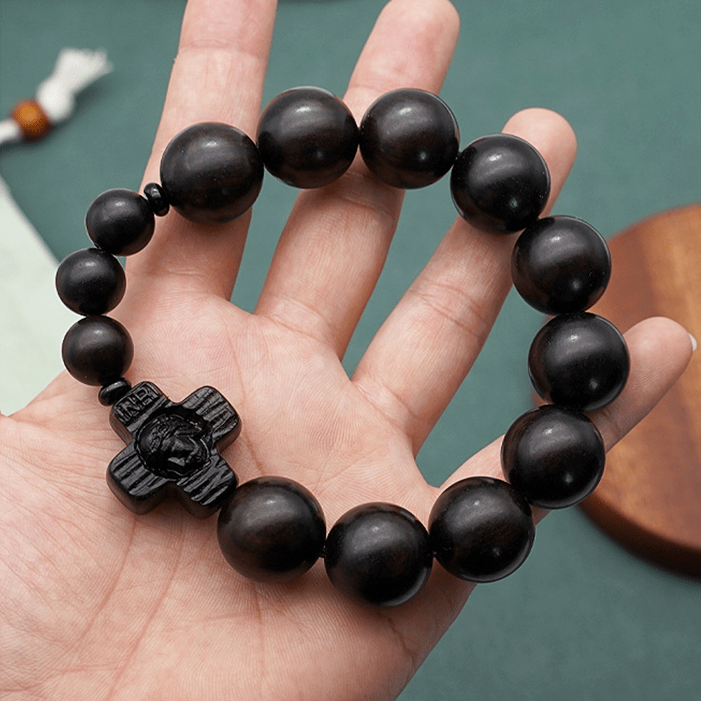 Pulsera de rosario de sándalo negro con cruz clásica de Jesucristo