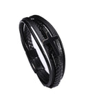 Pulsera con banda de cuero negro y cruz