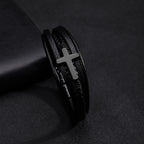 Pulsera con banda de cuero negro y cruz