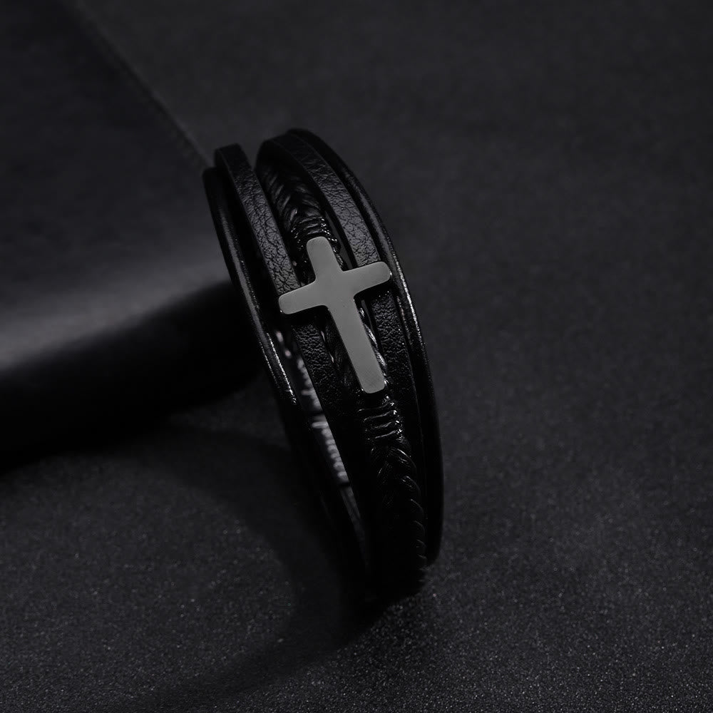Pulsera con banda de cuero negro y cruz