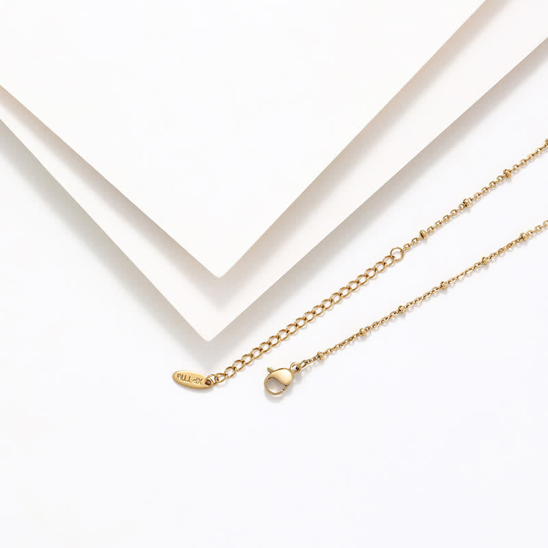 Elegante collar de medalla milagrosa y cruz sencillas en tono dorado