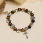 Pulsera Ojo de Tigre con Símbolo de San Benito: Una Fusión de Fe y Belleza
