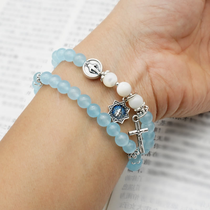 Pulsera Minimalista con Cuentas Azul Claro de 6 mm, Medalla Milagrosa y Crucifijo: Un Símbolo de Fe
