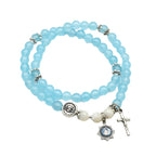 Pulsera Minimalista con Cuentas Azul Claro de 6 mm, Medalla Milagrosa y Crucifijo: Un Símbolo de Fe