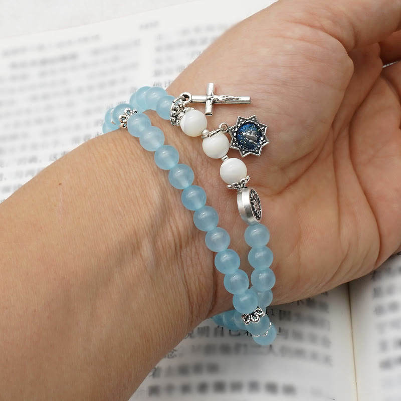 Pulsera Minimalista con Cuentas Azul Claro de 6 mm, Medalla Milagrosa y Crucifijo: Un Símbolo de Fe