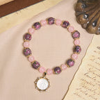 Pulsera de Cuarzo Rosa hecha a mano con camafeo de Nácar de la Virgen María