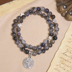 Pulsera Rosario de Cuentas Degrafiladas en Gris y Negro con San Benito: Escudo de Fe