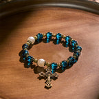 Spiritual Blue Gloss Bead Bracelets Featuring Sacred Brass Crucifix