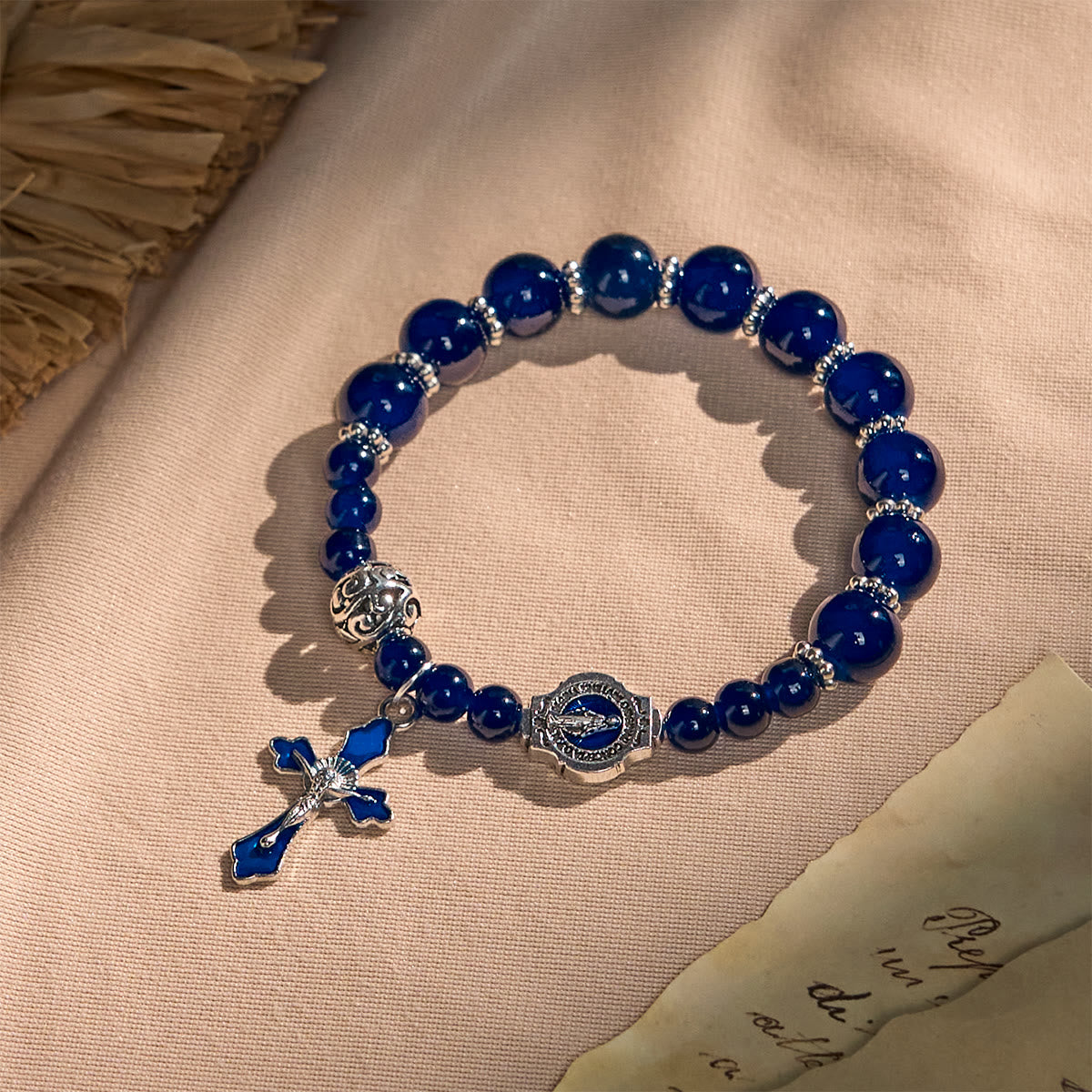 Elegantes pulseras de abalorios azul marino con crucifijo y Medalla Milagrosa