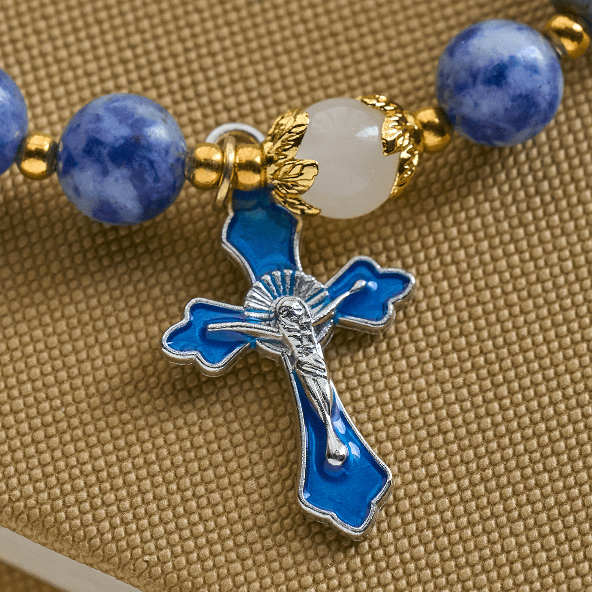 Pulsera Serene de Piedra Azul Texturizada con Crucifijo de Esmalte Azul