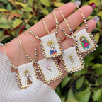 Lindos Collares de Dibujos Animados de Figuras Divinas: Un Símbolo Apreciado de Fe