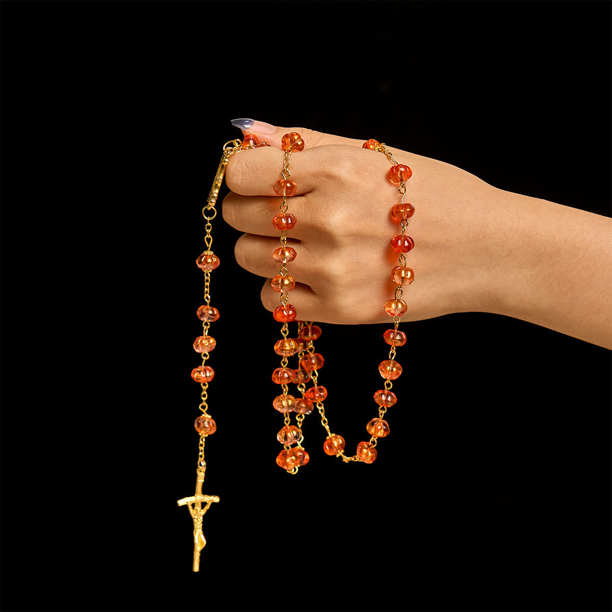 Rosario, pulsera con cuentas en forma de calabaza