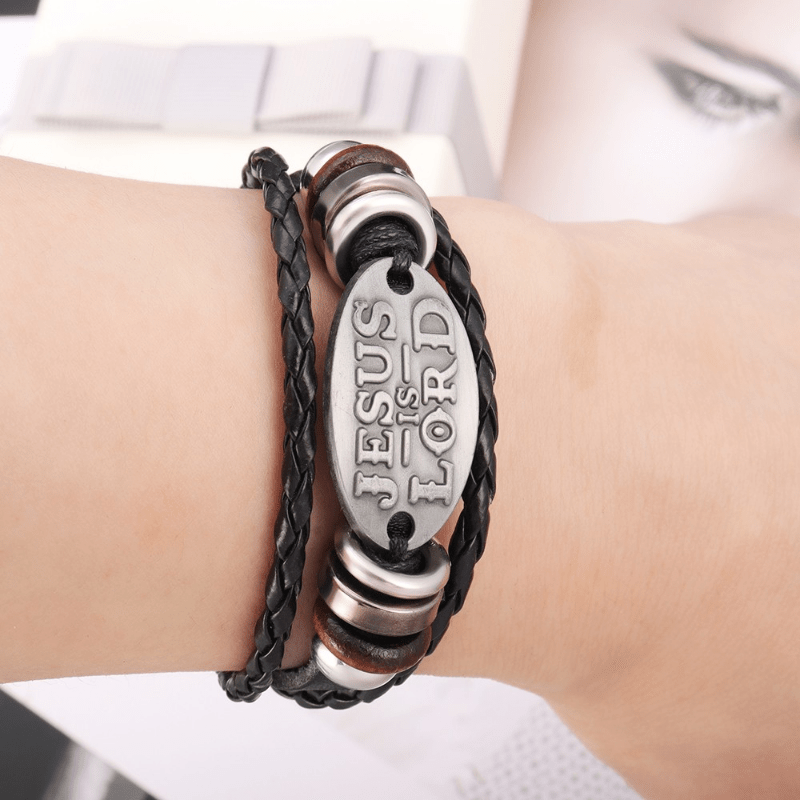 Pulsera de cuero trenzado negro con inscripción JESÚS ES SEÑOR