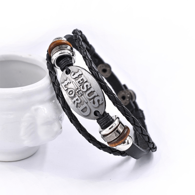 Pulsera de cuero trenzado negro con inscripción JESÚS ES SEÑOR