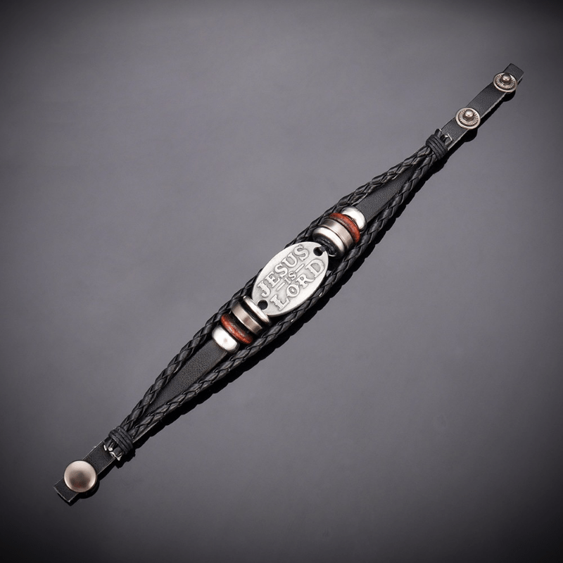 Pulsera de cuero trenzado negro con inscripción JESÚS ES SEÑOR