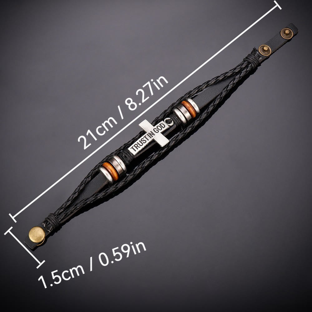 Pulsera de cuero trenzado negro con cruz e inscripción CONFIANZA EN DIOS