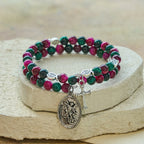 Pulsera de rosario de alambre de memoria de ojo de tigre bitono con San Miguel