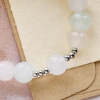 Pulsera de oración de cuentas UV que cambian de color Pastel Glow con Nuestra Señora