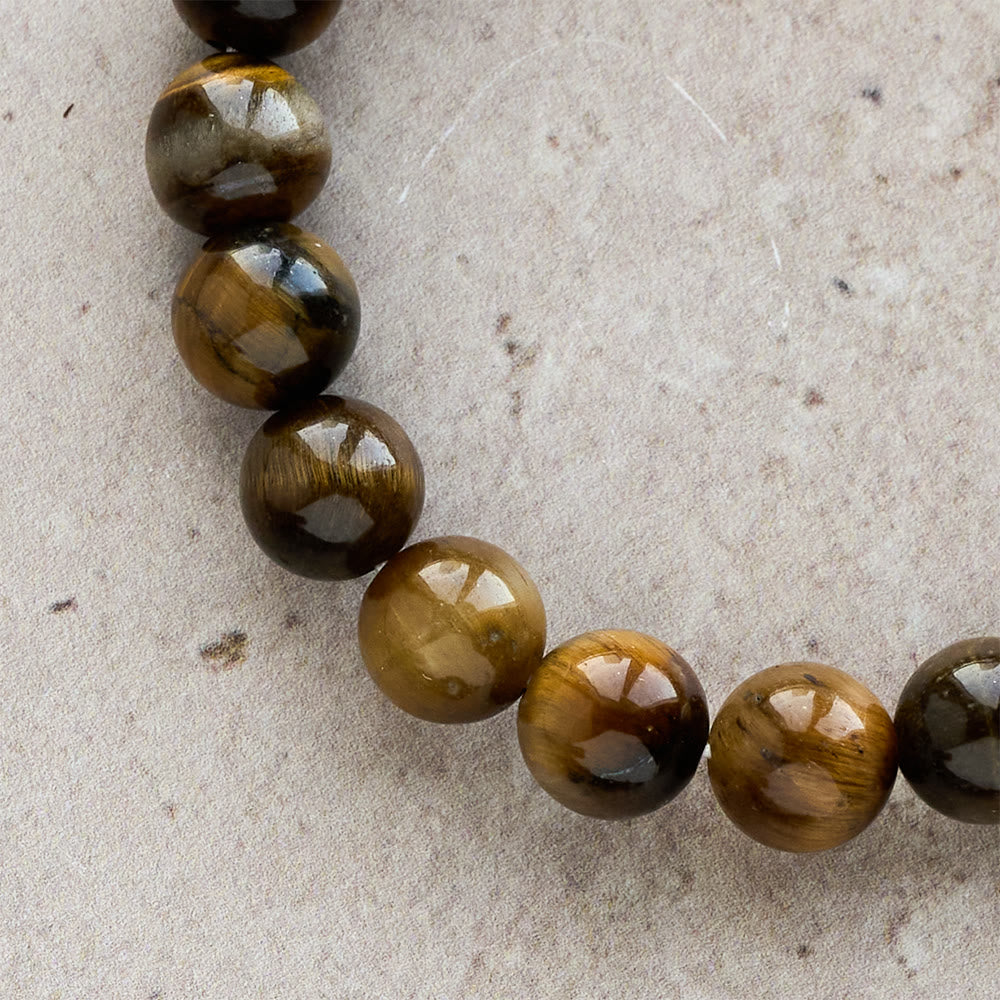 Pulsera estilo rosario Ojo de Tigre: Piedra de toque para la reflexión