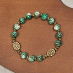 Rosario de cristal con pintura al óleo, pulsera: Recordatorio de fe y gracia para momentos de recogimiento