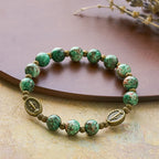 Rosario de cristal con pintura al óleo, pulsera: Recordatorio de fe y gracia para momentos de recogimiento