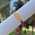 Pulsera Multicuerda de Nuestra Señora: Recordatorio silencioso de Su cuidado