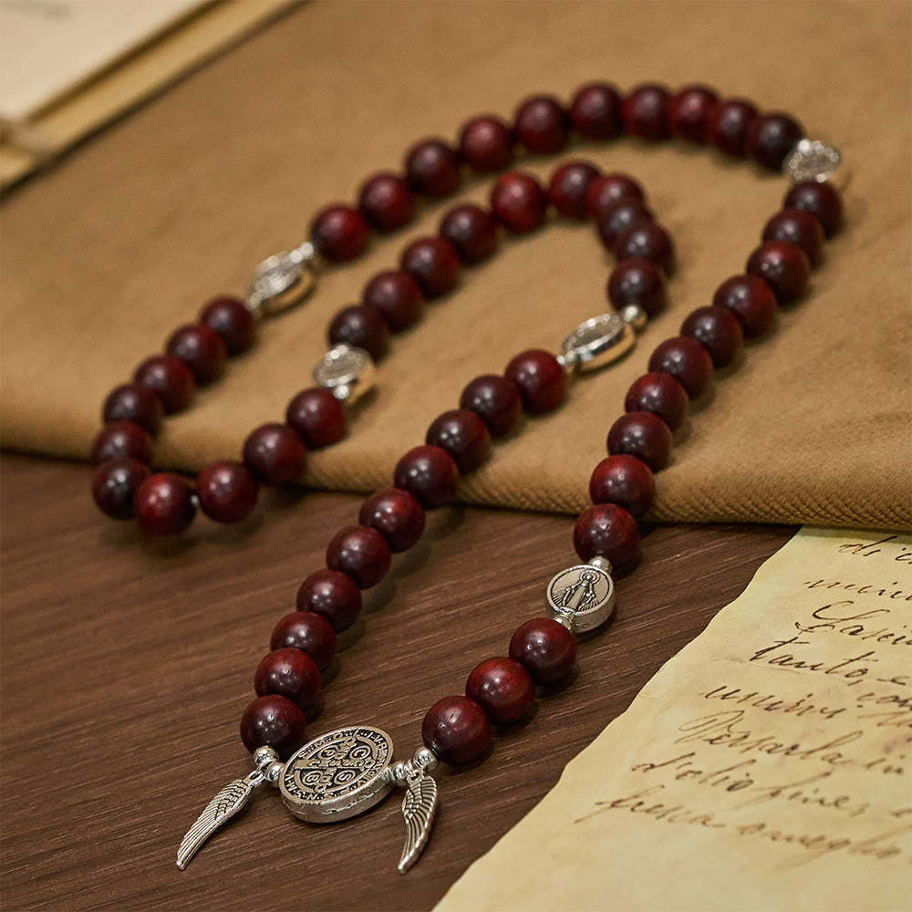 Pulsera de cuentas de sándalo con Medalla Milagrosa y alas de ángel