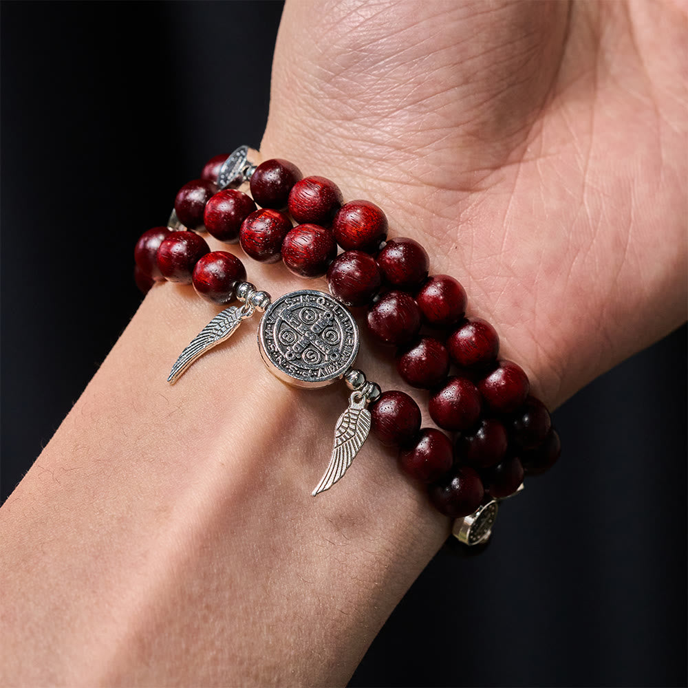 Pulsera de cuentas de sándalo con Medalla Milagrosa y alas de ángel