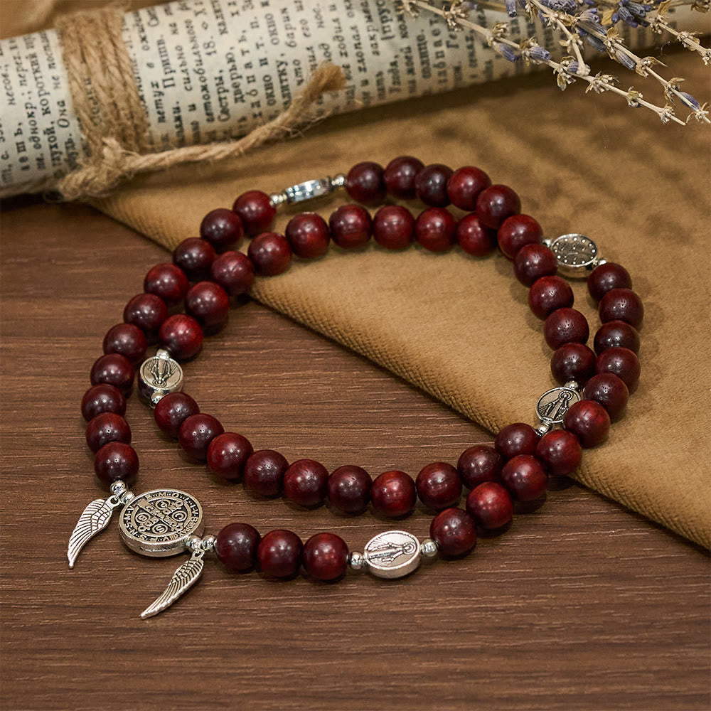 Pulsera de cuentas de sándalo con Medalla Milagrosa y alas de ángel