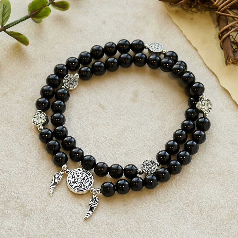 Pulsera de cuentas de sándalo con Medalla Milagrosa y alas de ángel