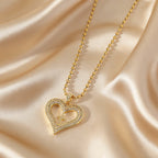 Collar con colgante Corazón y Cruz Dorados Brillantes: Encarna Su Amor Sagrado