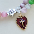 Pulsera de rosario de alambre de memoria de ojo de gato multicolor de 6 mm con detalles de San Benito