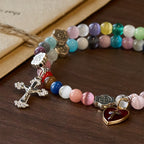 Pulsera de rosario de alambre de memoria de ojo de gato multicolor de 6 mm con detalles de San Benito