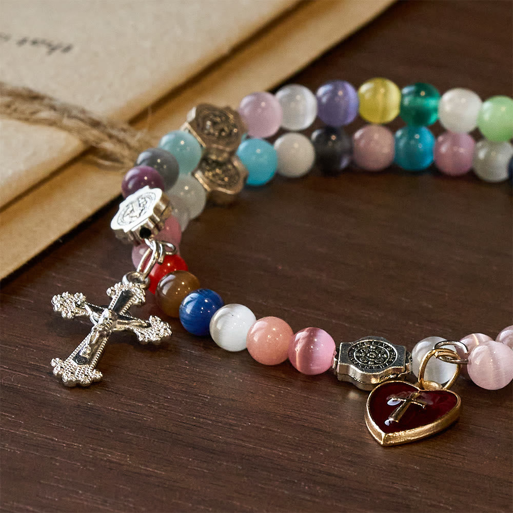 Pulsera de rosario de alambre de memoria de ojo de gato multicolor de 6 mm con detalles de San Benito