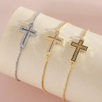 Pulsera con Cruz de Zirconia Dorada/Plateada/Negra: Encarna la Gracia de la Cruz