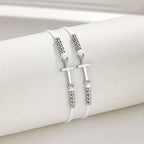 Pulsera con cuentas de cruz intrincada: tejida con fe, gracia y amor inquebrantable