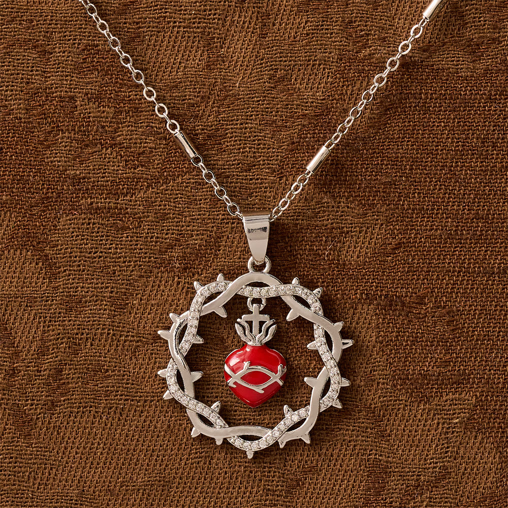 Collar bicolor con el Sagrado Corazón rodeado de espinas: Emblema del amor divino