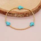 Pulsera de turquesas de diseño original con cuentas de cruz