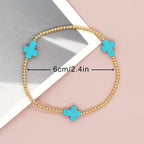 Pulsera de turquesas de diseño original con cuentas de cruz