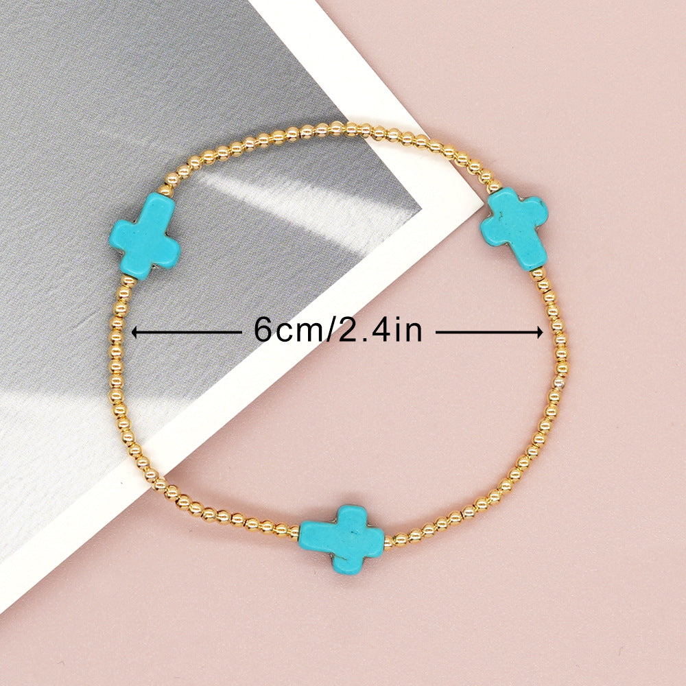 Pulsera de turquesas de diseño original con cuentas de cruz