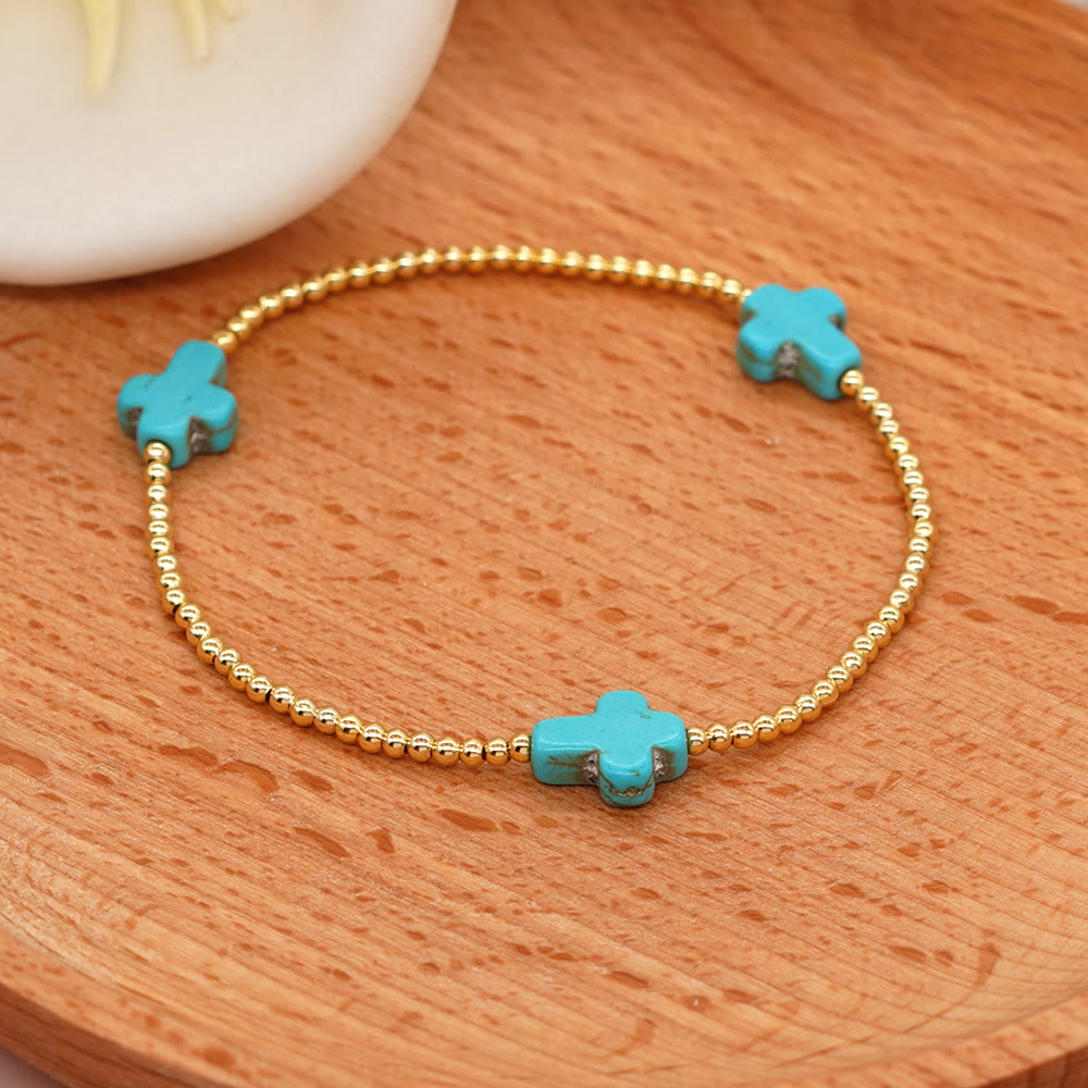 Pulsera de turquesas de diseño original con cuentas de cruz
