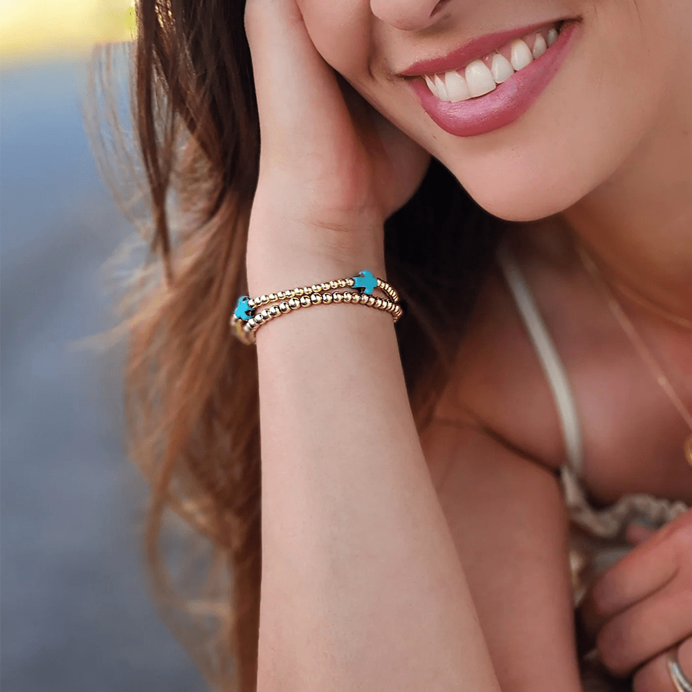 Pulsera de turquesas de diseño original con cuentas de cruz