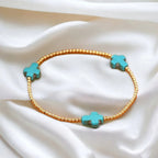 Pulsera de turquesas de diseño original con cuentas de cruz